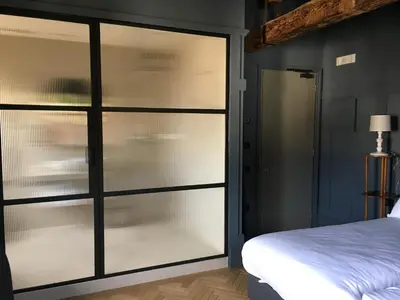Letto o letti in una camera di Hotel 5 Colonne