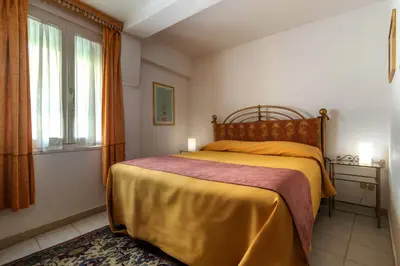 Letto o letti in una camera di Hotel Casa Boccassini