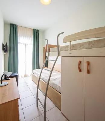 Letto o letti in una camera di Hotel Ginevra