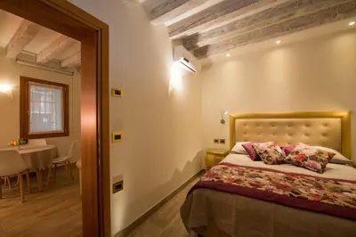 Letto o letti in una camera di Nike Appartamenti