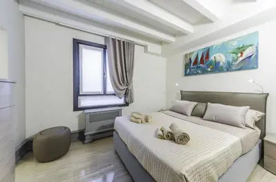 Letto o letti in una camera di Venice Residence