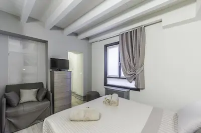 Letto o letti in una camera di Venice Residence