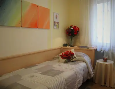 Letto o letti in una camera di Bed & Breakfast Delle Rose