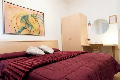 Letto o letti in una camera di Bed & Breakfast Delle Rose