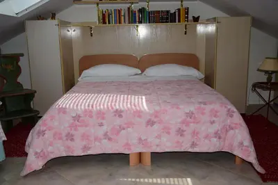 Letto o letti in una camera di B&B Il Glicine Fiorito