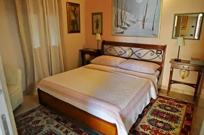 Letto o letti in una camera di Locanda Bellavista