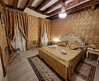 Letto o letti in una camera di La Residenza di Carlo close to Piazza San marco