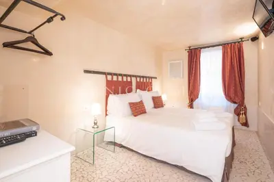 Letto o letti in una camera di VeNICe Cera Ca' del Gondoliere