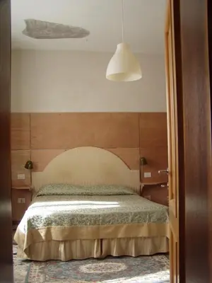 Letto o letti in una camera di b&b allo squero