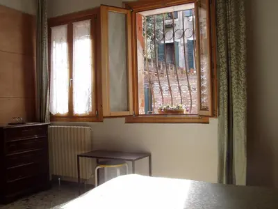Letto o letti in una camera di b&b allo squero
