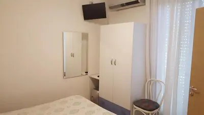 Letto o letti in una camera di Hotel Bellaria