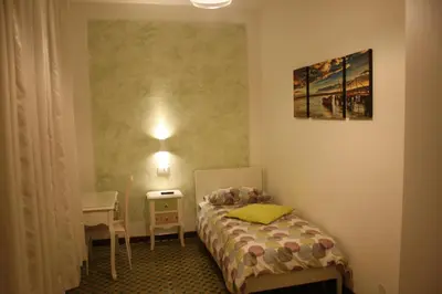 Letto o letti in una camera di Ca' ARiANna
