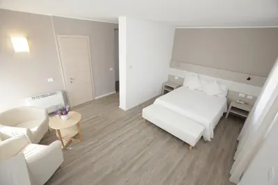 Letto o letti in una camera di Hotel Europa