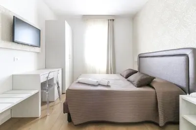 Letto o letti in una camera di Hotel Jesulum