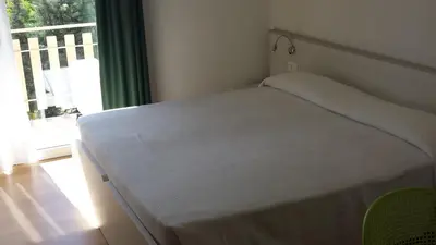 Letto o letti in una camera di Hotel Rado