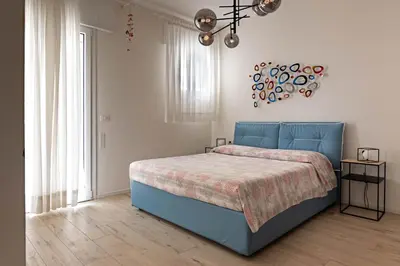 Letto o letti in una camera di Sea view apartment with swimming pool