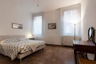 Letto o letti in una camera di KEY LOCATION near Palazzo Grassi