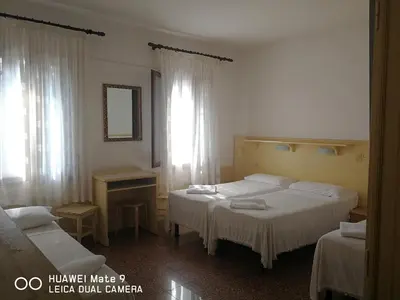 Letto o letti in una camera di Alloggi Gerotto Calderan 1