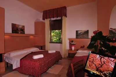 Letto o letti in una camera di Hotel Al Mare