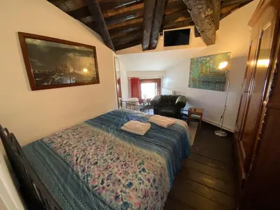 Letto o letti in una camera di Heart of Venice