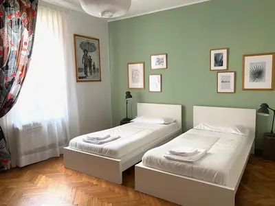 Letto o letti in una camera di Cà Giulia