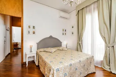 Letto o letti in una camera di B&B La Bragadina