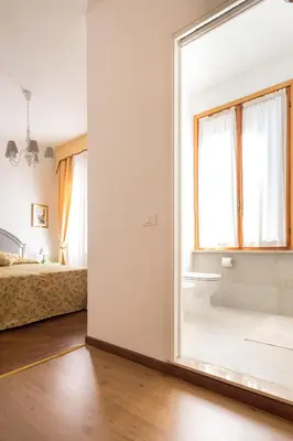 Letto o letti in una camera di B&B La Bragadina
