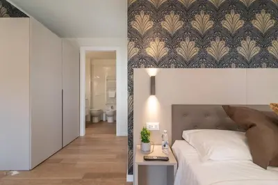 Letto o letti in una camera di Hotel Grifoni