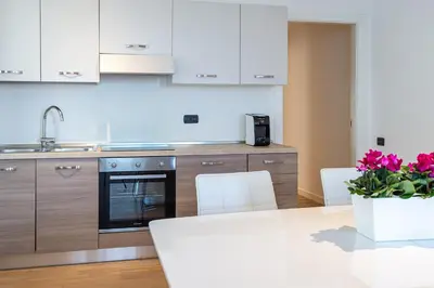 Cucina o angolo cottura di UNA Hotels Le Terrazze Treviso Hotel & Residence