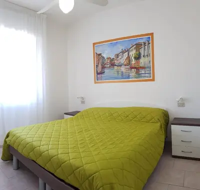 Letto o letti in una camera di Residence Nova Marina
