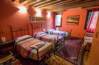 Letto o letti in una camera di between the channels, in San Marco