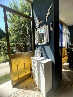 TV o dispositivi per l'intrattenimento presso Bungalows Alloggi Angiolin Ketty