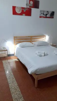 Letto o letti in una camera di Ca Paola Lido di Venezia
