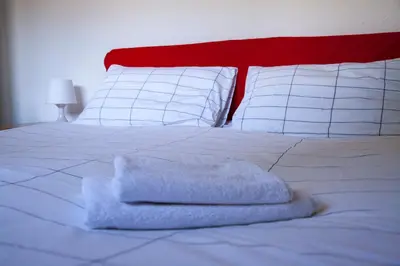 Letto o letti in una camera di Ca' Bianca Relax Apartment