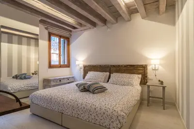 Letto o letti in una camera di SAN POLO 2140 IN THE HEART OF VENICE
