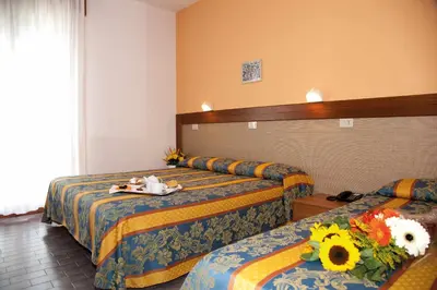 Letto o letti in una camera di Hotel Bettina