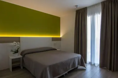 Letto o letti in una camera di Almalux Jesolo Wellness & Spa 3 stelle superior