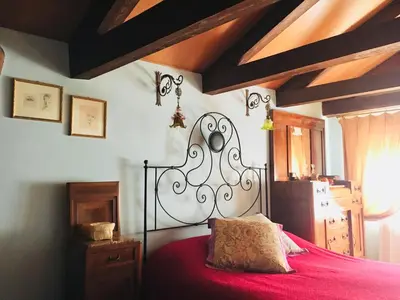 Letto o letti in una camera di Suite Attico con Altana