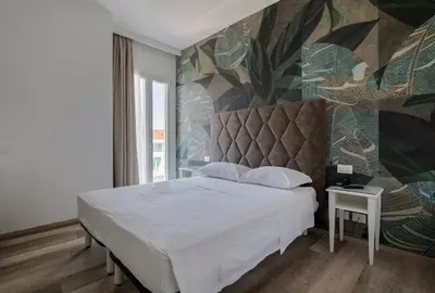 Letto o letti in una camera di Hotel President