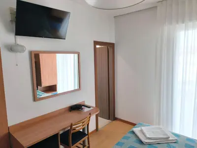 TV o dispositivi per l'intrattenimento presso Hotel Midi