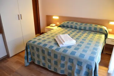 Letto o letti in una camera di Hotel Midi