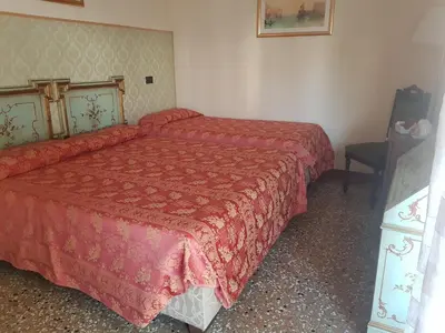Letto o letti in una camera di Venice Lion Residence - Vespucci