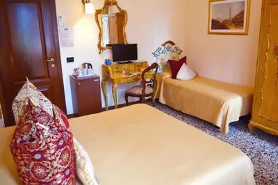 Letto o letti in una camera di Venice Lion Residence - Vespucci