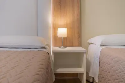 Letto o letti in una camera di Hotel Suez