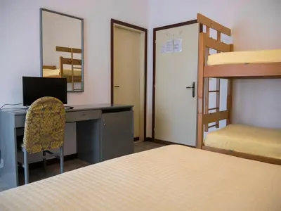 Letto o letti in una camera di Hotel Casa Mia