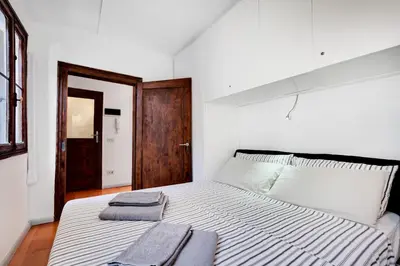 Letto o letti in una camera di Bragora Smoochy Attic In Venice