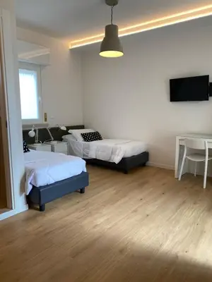 Letto o letti in una camera di Hotel Concordia