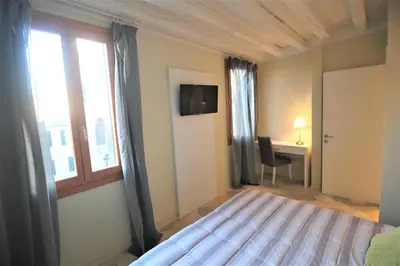 Letto o letti in una camera di New central and spacious