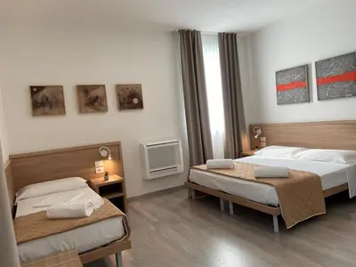 Letto o letti in una camera di Locanda Damaro