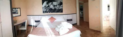 Letto o letti in una camera di Hotel Locanda Dolce Vita